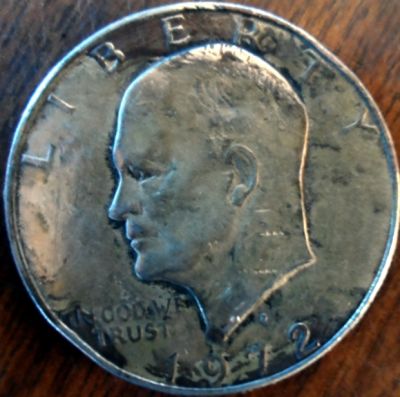 What-Happened-To-This-Ike-Dollar-?-Can-Anybody-Tell-Me?